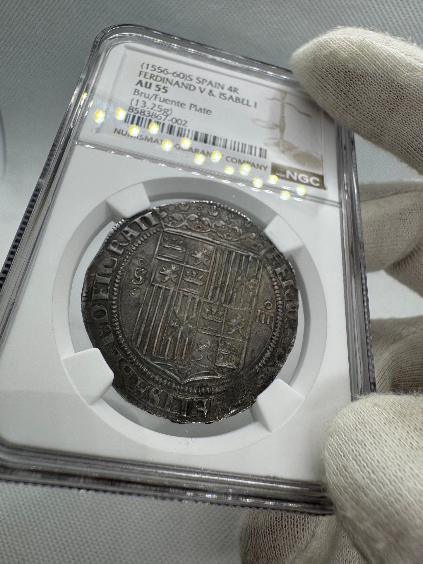 [NGC TOP POP] Reyes Católicos (1474-1504). 4 reales. (1556-1560). Sevilla. Estrella. (Cal-561). Ag. 13,25g. NGC AU55.