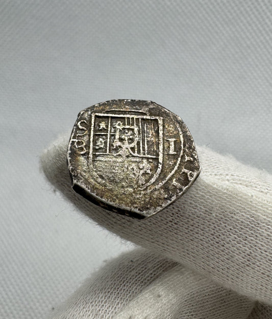 Felipe II (1566-1598). 1 real. 1597. Sevilla. B. Tipo “OMNIVM”. (Cal-275). (Jarabo-Sanahuja-A766). Ag. 3,35g.